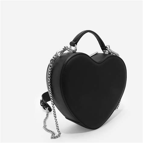 heart shaped crossbody bag.